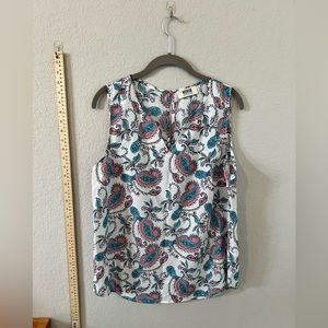 Verse large sleeveless blouse